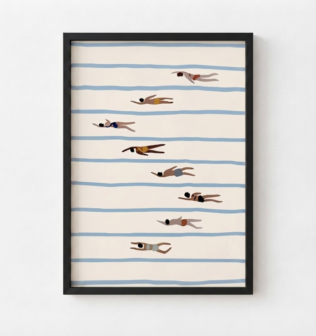 Framed wall art featuring a minimalist illustration of people swimming horizontally across cream-colored water with light blue stripes, displayed in a black frame against a white wall.